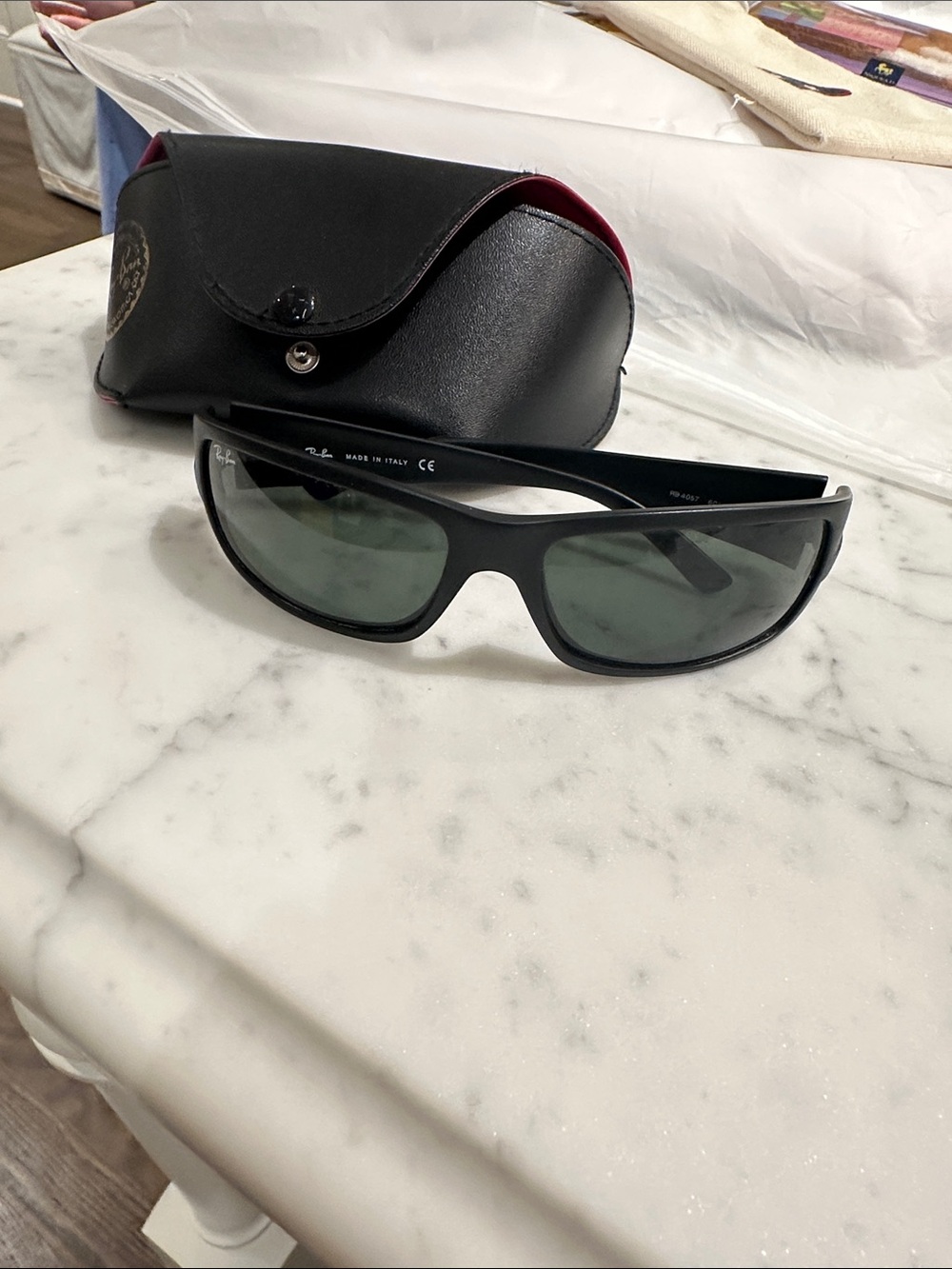 Ray-Ban Black Frame Sunglasses with Green Lenses